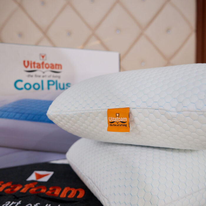 A vacuum-packed mattress expanding out of its box