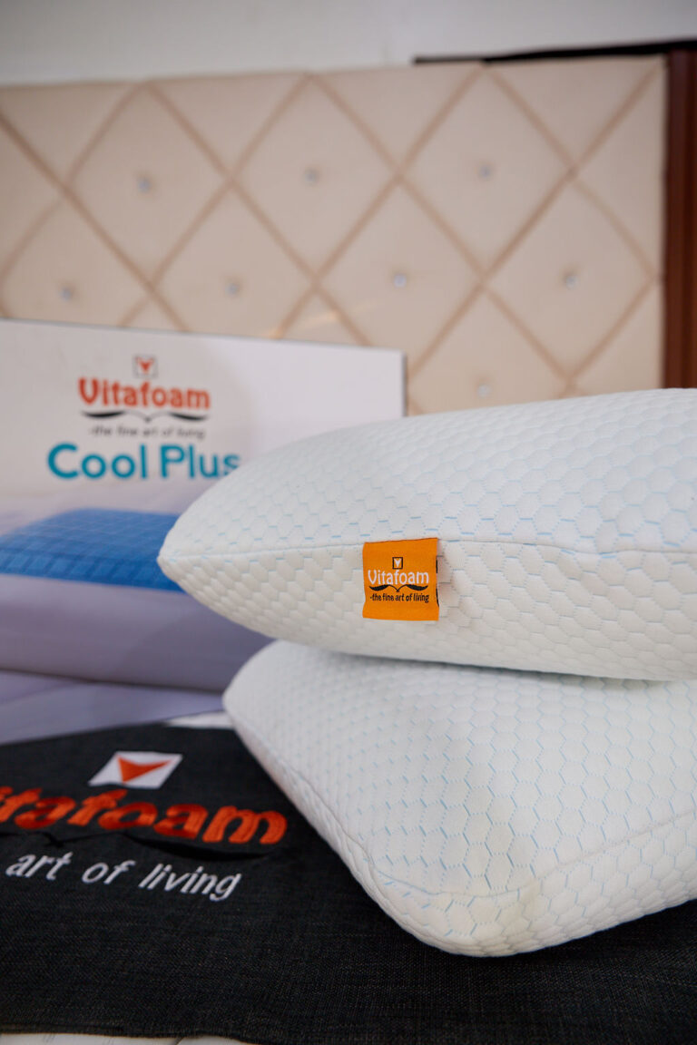A vacuum-packed mattress expanding out of its box